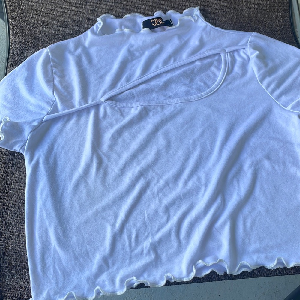 Cute white crop top shirt .